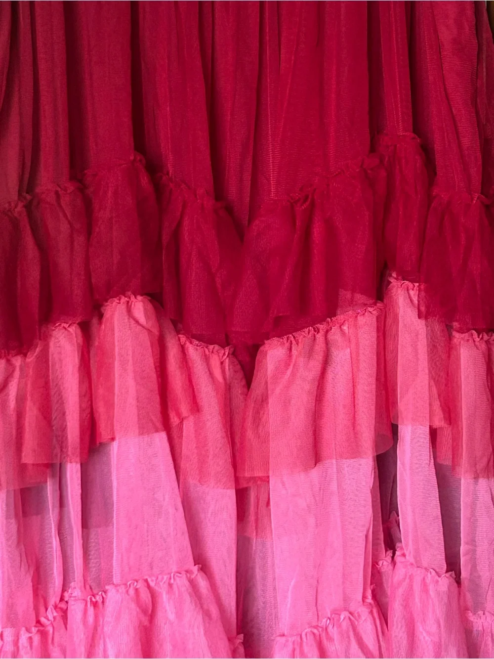 A-line skirt with ruffle tiers in burgundy and pink with elastic waist band. - Picture 2 of 12